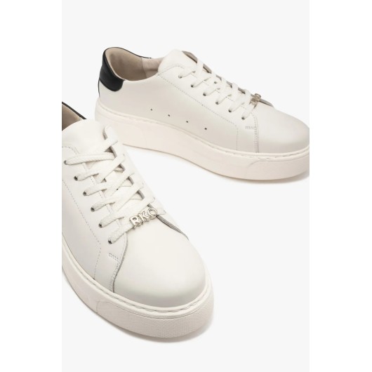 Białe półbuty sportowe Ryłko z kontrastową czarną piętą