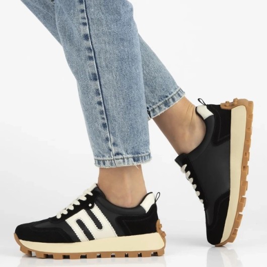 Skórzane sneakersy damskie Filippo – czarne buty sportowe na platformie